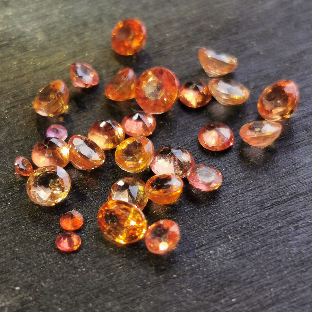 Zaffiri arancio taglio rotondo 4,77 ct totali