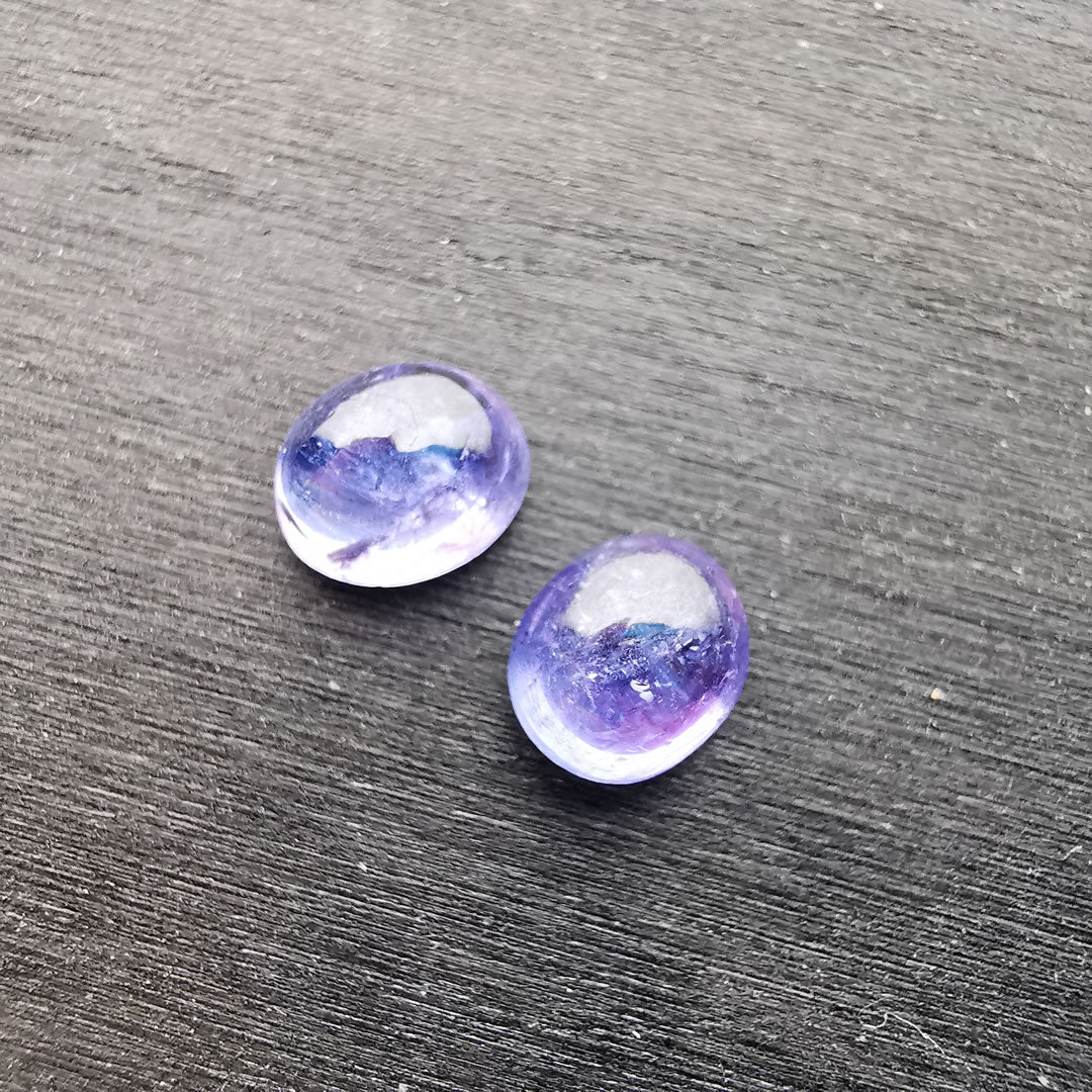 Coppia di Tanzaniti taglio ovale cabochon 2,85 ct