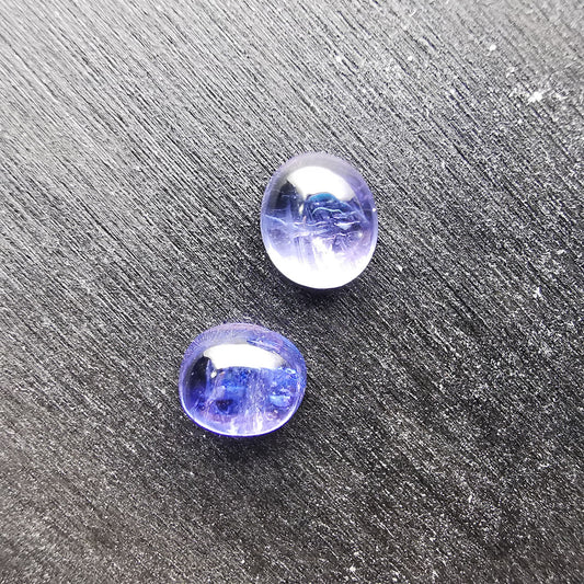 Coppia di Tanzaniti taglio ovale cabochon 1,62 ct