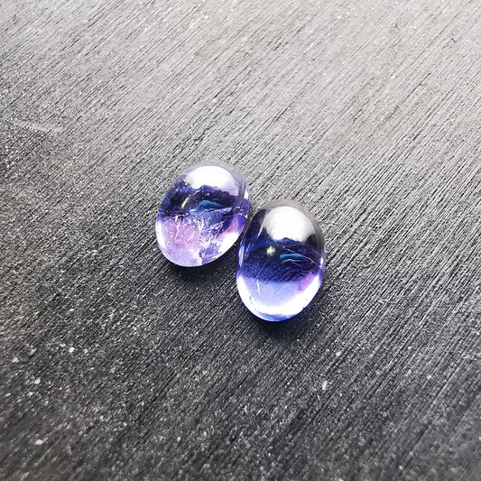 Coppia di Tanzaniti taglio ovale cabochon 1,81 ct