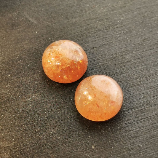 Pietra di Sole taglio rotondo cabochon 6,68 ct